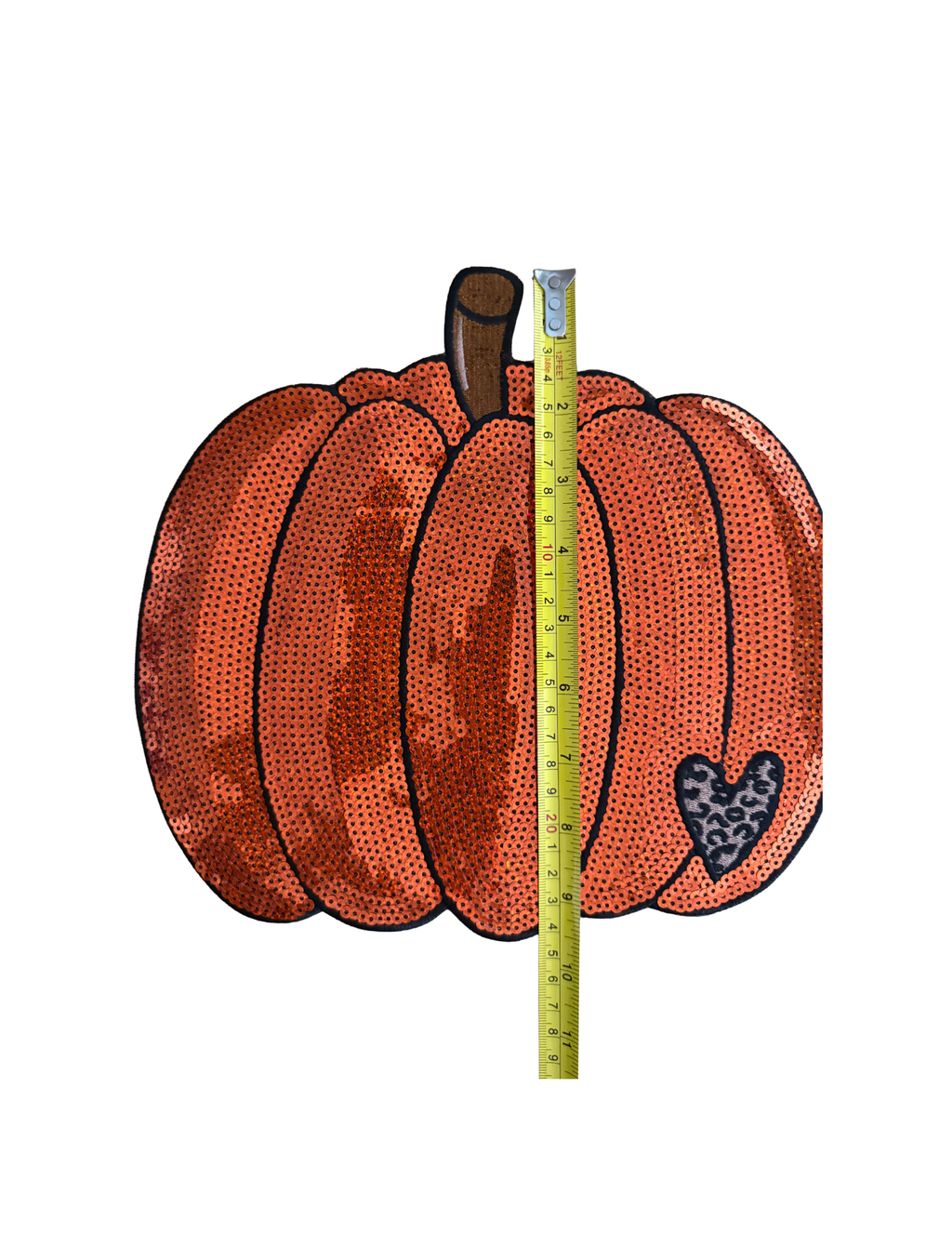Covered in shimmering orange detail and finished with a sweet leopard-print heart, this design brings together everything we love about fall—warm autumn color, cozy vibes, sparkle, and just a touch of sass.