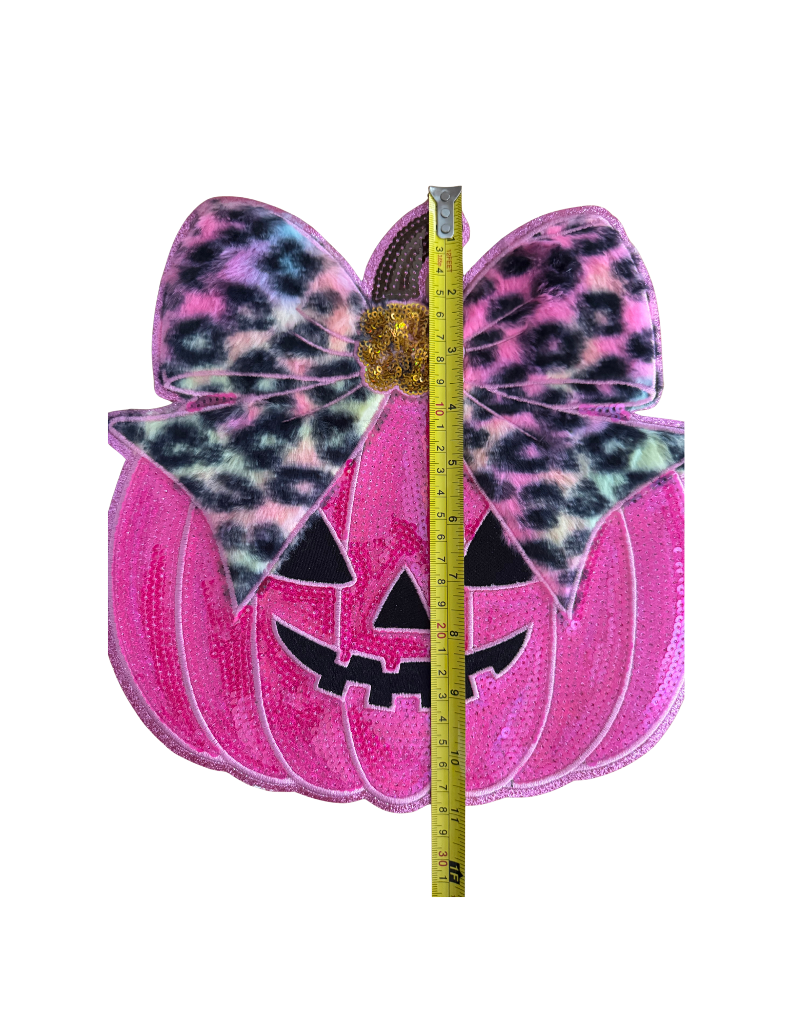 Sweet meets spooky in the cutest way. This eye-catching patch combines a vibrant pink jack-o'-lantern with a trendy leopard-print bow, creating a Halloween design that's fun, feminine, and unlike anything you'll find in big box stores.