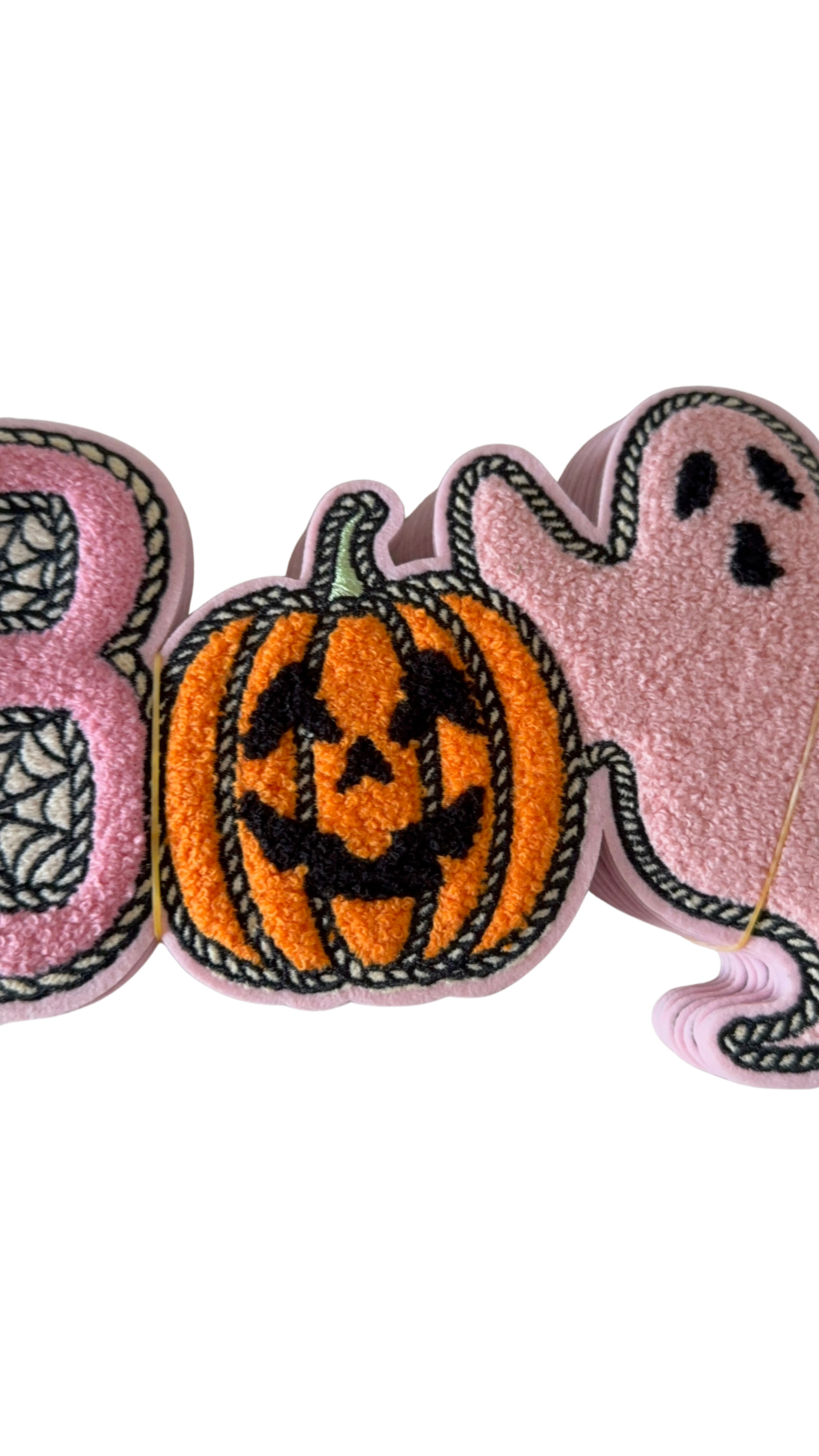 Featuring a plush pink chenille “B” filled with spiderweb details, a classic orange jack-o’-lantern, and the cutest little pink ghost, this design mixes traditional Halloween fun with a trendy, girly twist.