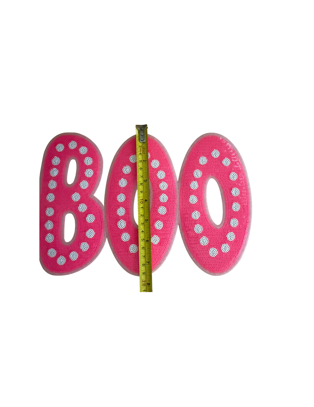 Who says Halloween has to be orange and black? This bold BOO patch gives spooky season a playful pop of pink! Featuring bright hot-pink lettering