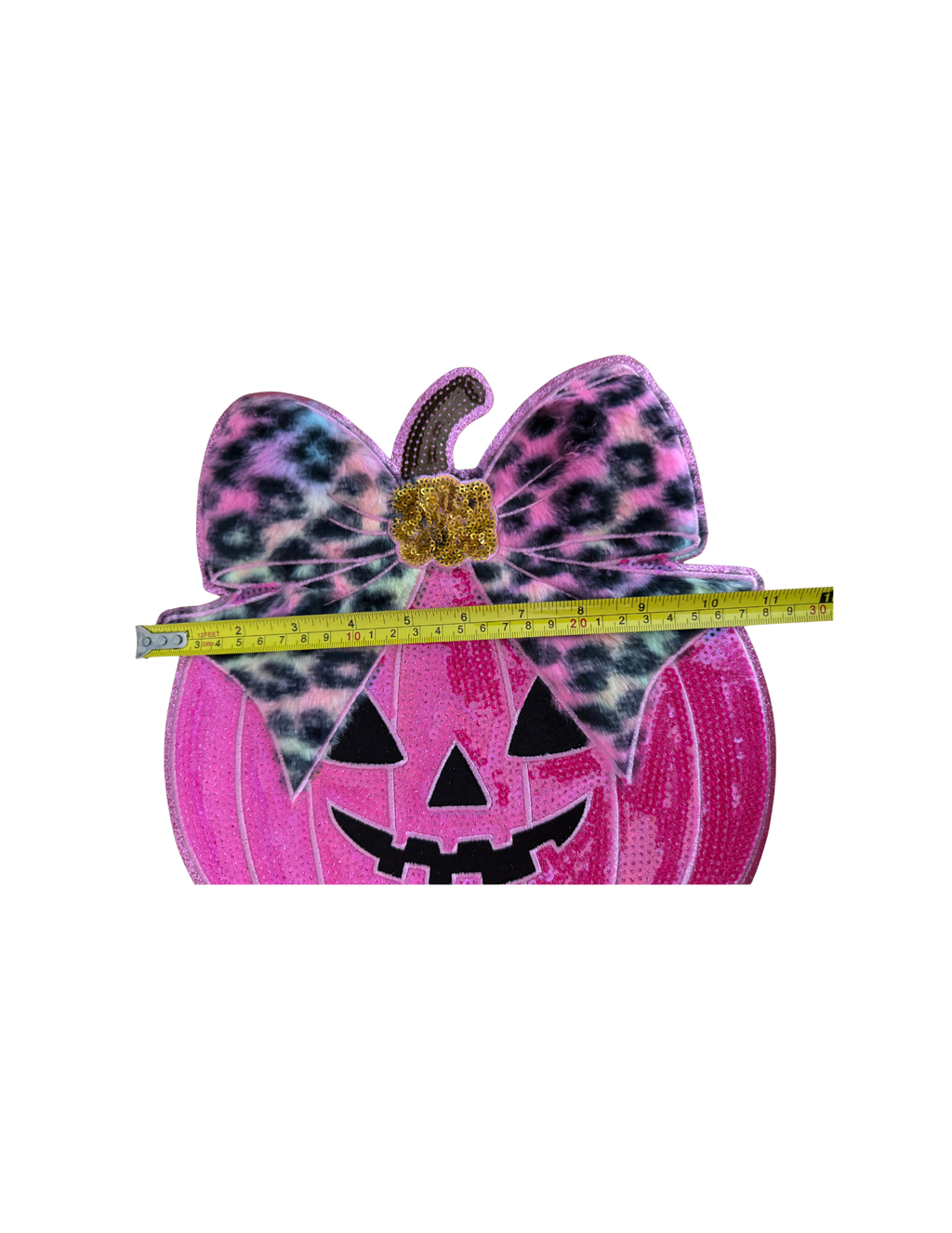 Sweet meets spooky in the cutest way. This eye-catching patch combines a vibrant pink jack-o'-lantern with a trendy leopard-print bow, creating a Halloween design that's fun, feminine, and unlike anything you'll find in big box stores.