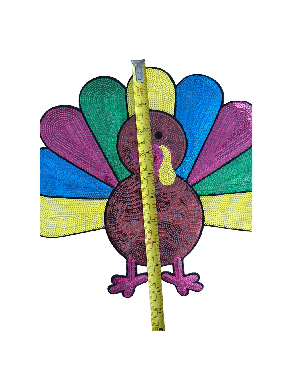 Featuring a rich embroidered brown turkey surrounded by bright pops of blue, green, yellow, and pink, this playful design puts a fresh, cheerful spin on traditional fall style. The bold colors and detailed stitching make this turkey impossible to overlook
