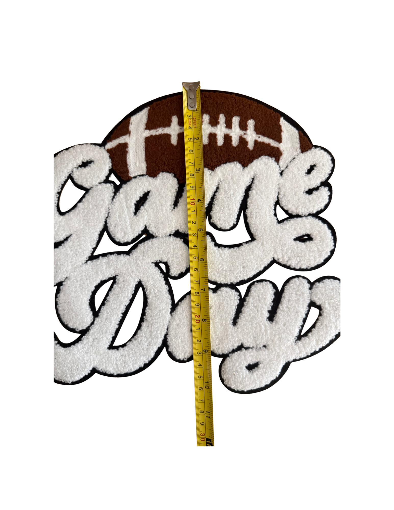 Turn up the team spirit with this bold and cozy Game Day Football Patch! Featuring a classic brown football paired with oversized, fluffy white chenille lettering, this patch delivers the perfect combination of sporty style and boutique texture.