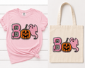 Featuring a plush pink chenille “B” filled with spiderweb details, a classic orange jack-o’-lantern, and the cutest little pink ghost, this design mixes traditional Halloween fun with a trendy, girly twist.
