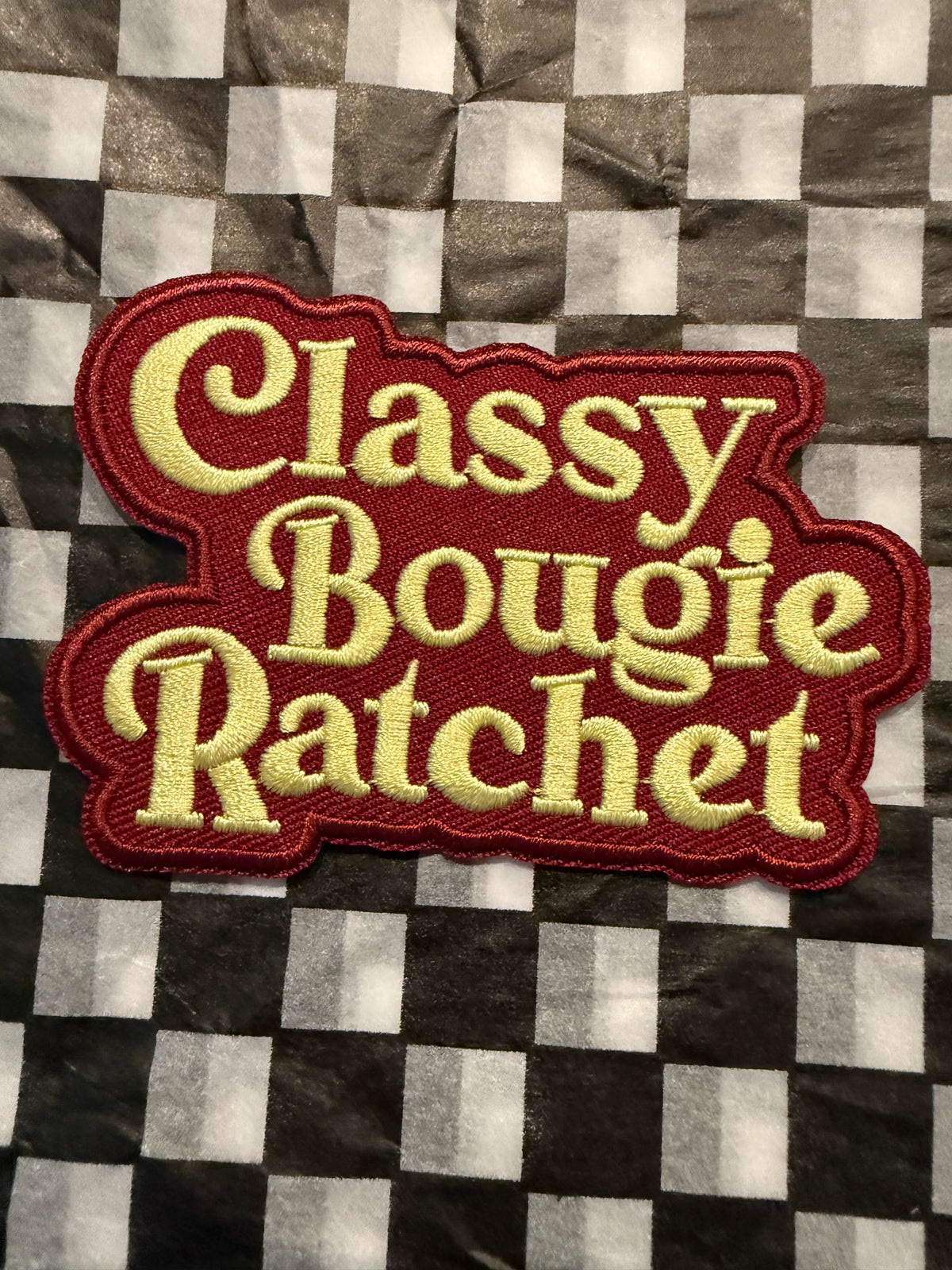 The “Classy Bougie Ratchet” embroidered iron on patch is made for anyone who can serve sophistication, spoil themselves a little, and still bring the attitude when necessary.