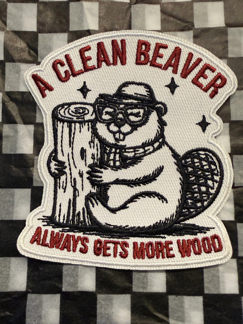 A CLEAN BEAVER Iron-On Patch  Always Gets More Wood  Funny, bold, and a little bit dirty—this patch brings the laughs and the attitude. Featuring a well-groomed beaver, it’s the perfect icebreaker for anyone who doesn’t take life too seriously.