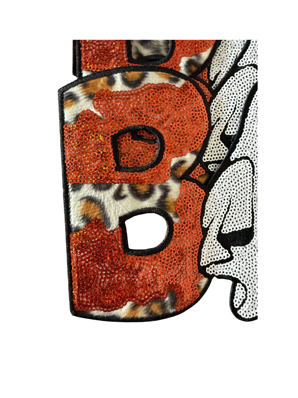Featuring bold leopard print, shimmering orange glitter, an adorable ghost, and a tiny jack-o'-lantern, it perfectly blends spooky season with boutique style. Designed to stand out!