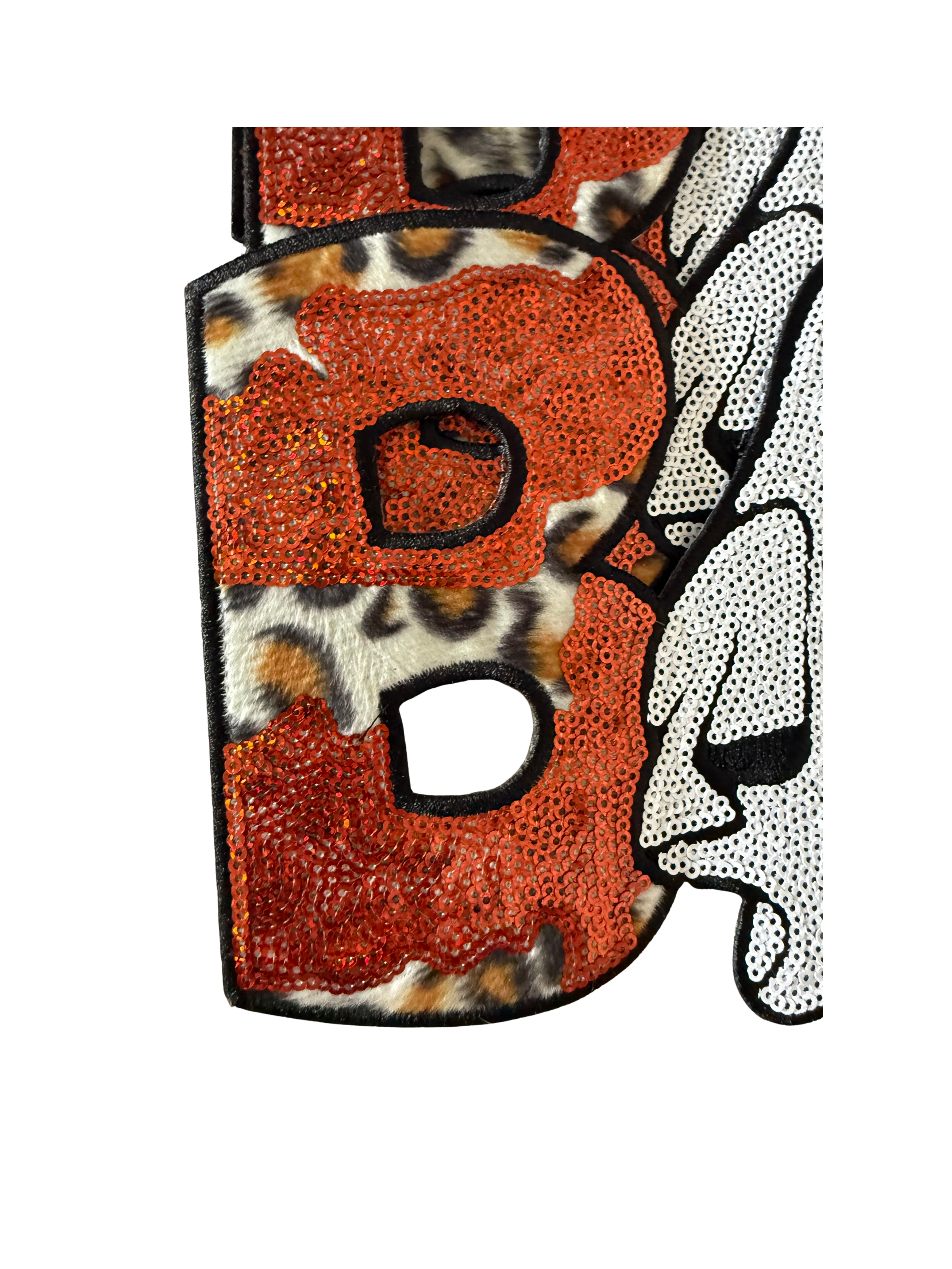 Featuring bold leopard print, shimmering orange glitter, an adorable ghost, and a tiny jack-o'-lantern, it perfectly blends spooky season with boutique style. Designed to stand out!